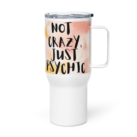 Stainless steel travel coffee mug. Stainless steel tea travel mug. 25oz, stainless steel, BPA-free, plastic travel mug with handle and plastic spill-proof lid. White mug with pink, yellow, and white color design and black "Not Crazy Just Psychic" quote/mantra/slogan/tagline/saying/motto. Right side view. JAMILLIAH'S WISDOM IS TIMELESS SHOP - wisdomistimeless.com.