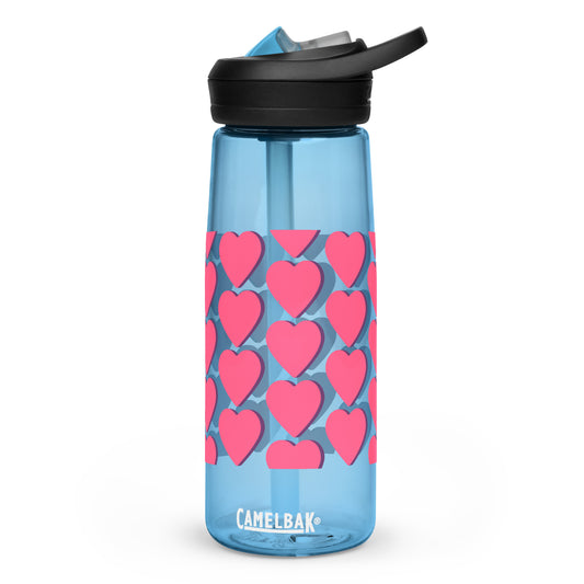 CamelBak Eddy®+ heart water bottles with straw made from recycled materials and BPA free plastic. 25oz Sports water bottle for sale online; blue with pink hearts with purplish outline, black and blue top, and CamelBak brand name on the front. Water bottles Eastman Tritan™ Renew 50% recycled material, spill-proof screw-on lid with bite valve, and single-finger carry-handle. JAMILLIAH'S WISDOM IS TIMELESS SHOP - wisdomistimeless.com.