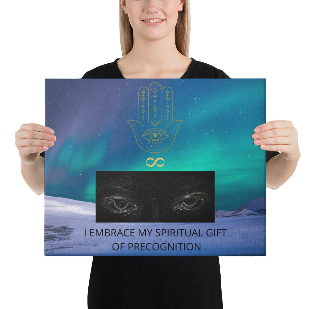 16x20 inch canvas print landscape with logo and slogan/saying/tagline. Original hamsa hand/infinity logo, northern lights/polar lights/aurora borealis sky, and authentic psychic's eyes design. Supernatural wise quote mantra, "I Embrace My Spiritual Gift Of Precognition." - Jamilliah - Shown with female model holding the canvas art print, in front of white background. JAMILLIAH'S WISDOM IS TIMELESS SHOP - wisdomistimeless.com.