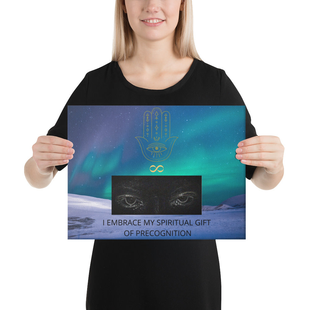 12x16 inches, canvas print landscape with logo and slogan/saying/tagline. Original hamsa hand (hand of God) and infinity symbol (the lemniscate) logo. Northern lights/polar lights (aurora borealis) sky, and authentic meditative eyes design. Otherworldly, original wise quote mantra, "I Embrace My Spiritual Gift Of Precognition." - Jamilliah - Shown with female model holding the canvas art print. JAMILLIAH'S WISDOM IS TIMELESS SHOP - wisdomistimeless.com.