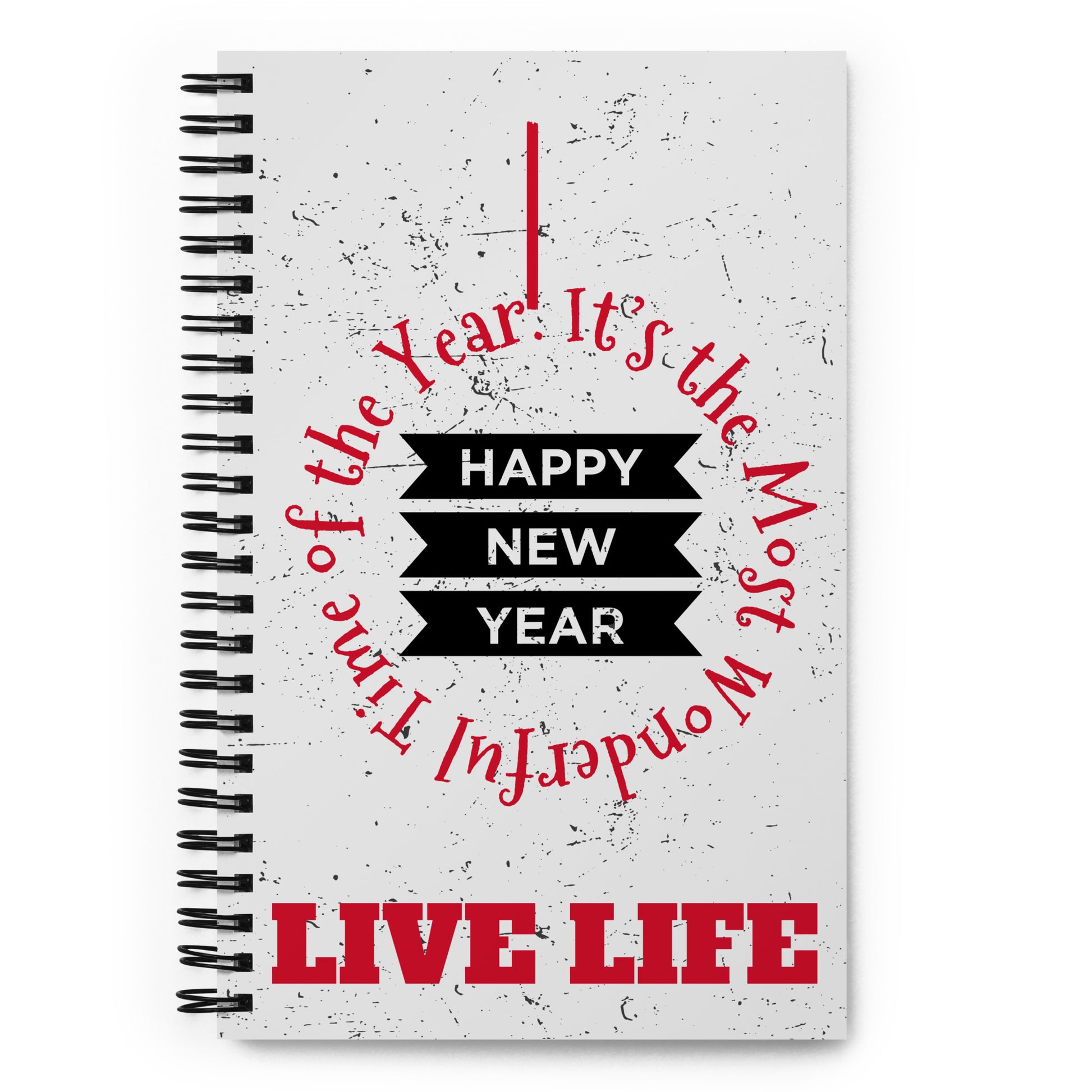 Metal wire-o binding/spiral diary/notepad/notebook. Gray-white cover with gray-black speckles, front view. Wise quotes/mantras/mottos/sayings/taglines. "It's the Most Wonderful Time of the Year," "Live Life," (red) and "Happy New Year" (black and white.) 140 dotted pages. 5.5 inches x 8.5 inches. Shown in the hands of a model wearing blue jeans. Jamilliah's Wisdom Is Timeless Shop - wisdomistimeless.com.