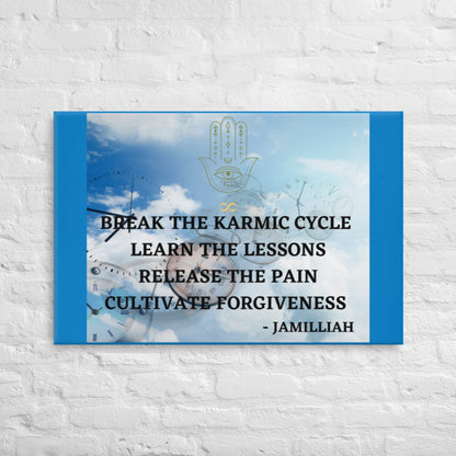 24x36 inch canvas print with original logo and authentic motto. Art with clocks in a blue sky with white fluffy clouds and hamsa hand/infinity sign logo. Unique, wise quote mantra written in black print. "Break The Karmic Cycle, Learn The Lessons, Release The Pain, Cultivate Forgiveness." - Jamilliah - Images surrounding majority of textured canvas, with the remainder of the canvas colored blue. Shown on a white brick wall. JAMILLIAH'S WISDOM IS TIMELESS SHOP - wisdomistimeless.com.