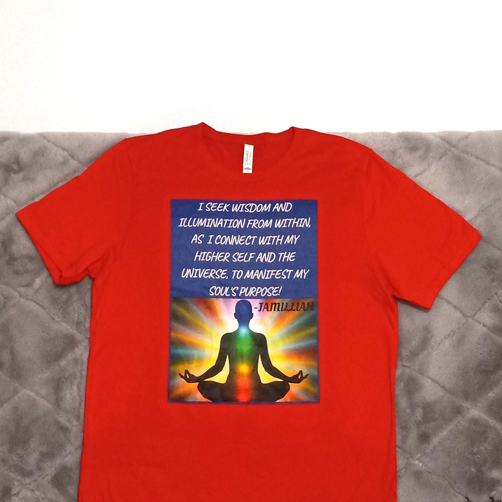 Unisex, red, Bella + Canvas 3001 short sleeve T-shirts. Designed with zen image of a being in lotus pose, having colorful balanced chakras, surrounded by rainbow light aura. Original wise quote/mantra/slogan/tagline/saying/motto written in white, blue background. "I Seek Wisdom And Illumination From Within, As I Connect With My Higher Self And The Universe, To Manifest My Soul's Purpose!" - Jamilliah. Shown with jeans/sneakers/wallet/glasses/watch. JAMILLIAH'S WISDOM IS TIMELESS SHOP - wisdomistimeless.com.