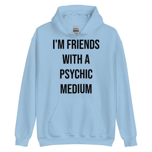 Gildan brand, light blue, unisex, heavy blend, hoodie; front. Otherworldly, supernatural tagline. "I'm Friends With A Psychic Medium." Shown upright on white background. JAMILLIAH'S WISDOM IS TIMELESS SHOP - wisdomistimeless.com.