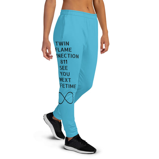 Women's blue joggers with original design, angel number 811, infinity sign, and supernatural quote, right leg. "Twin Flame Connection 811, See You Next Lifetime." JAMILLIAH'S WISDOM IS TIMELESS SHOP - wisdomistimeless.com.