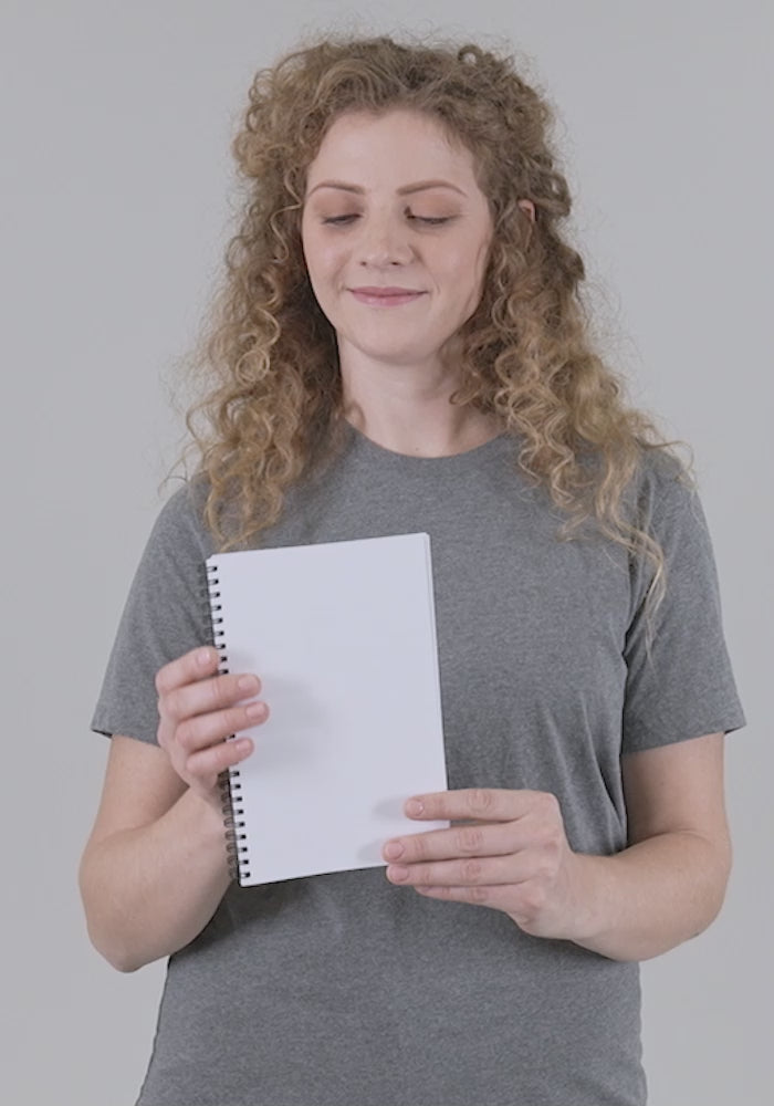 Spiral Notebook mp4 video. Live female model showcasing spiral notebook with 140 dotted pages and soft covers. Jamilliahs Wisdom Is Timeless Shop - wisdomistimeless.com